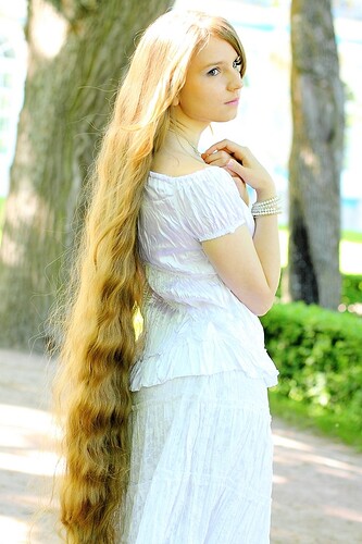 very beautiful young woman with very long hair