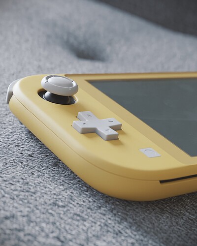 NintendoSwitchLite_OnCouch_Detailshot1