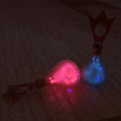 Two Yellow Bottles with Lights off (Orbs: Pink and Light Blue)