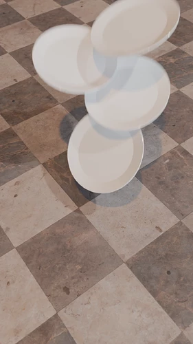 ceramic plates falling toward a tile floor