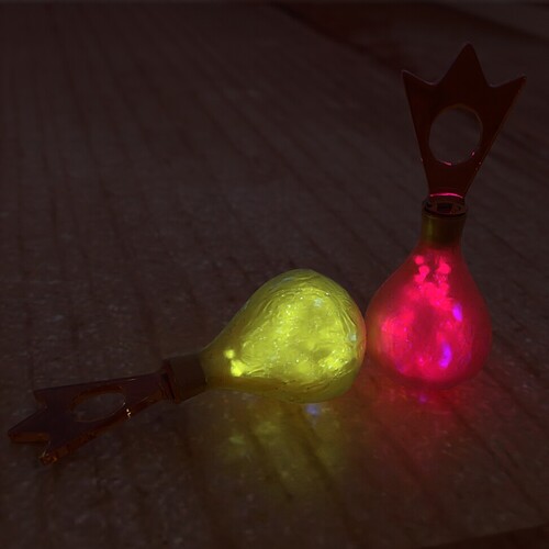 Two Yellow Bottles with Lights off (Orbs: Yellow and Strong Pink)
