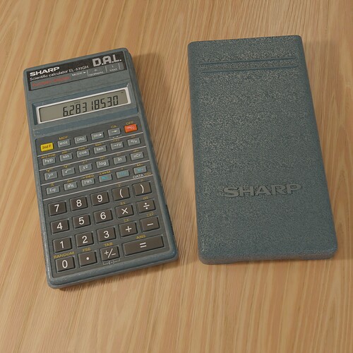 Sharp DAL calculator with removed cover on top of wooden surface—top view